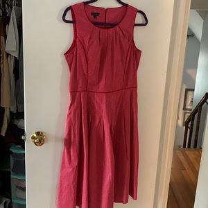 Pixie style red and white polka dot dress.